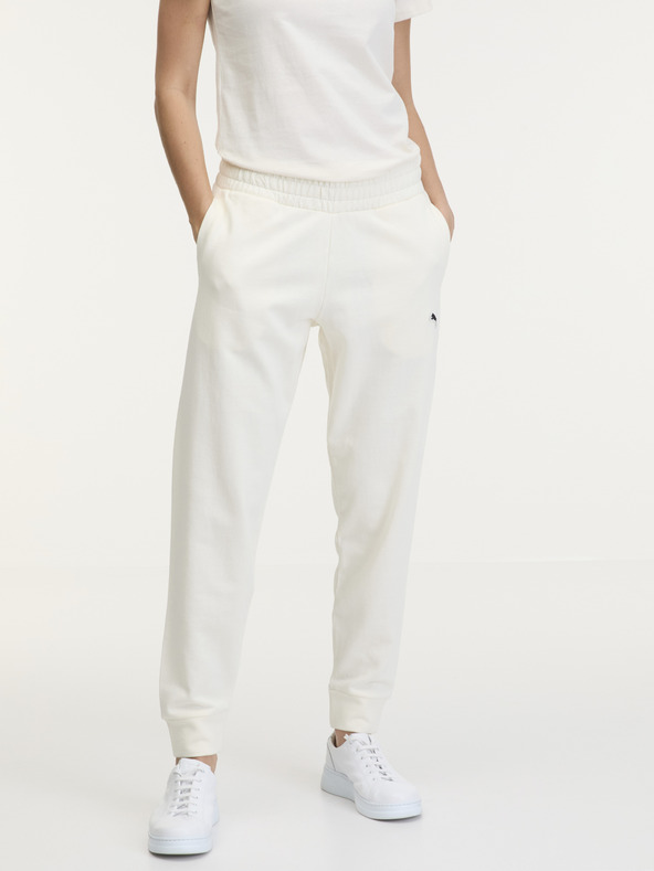 Puma Krémové dámské tepláky Puma Better Essentials